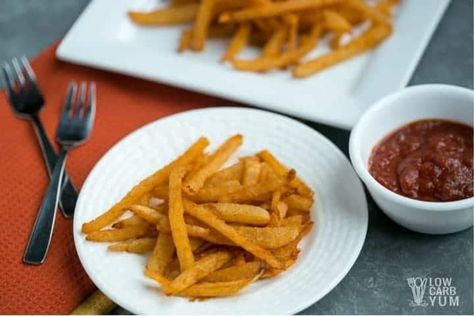 Is there such a thing as low carb French fries? Jicama fries are about as close as you can get. Here's the basics on how to make them. #ketofries #lowcarbfries | LowCarbYum.com Keto Fries, Jicama Recipe, Jicama Fries, Low Carb Ketchup, Keto Fast Food, Seasoned Fries, Community Table, Roasted Radishes, Fries Recipe