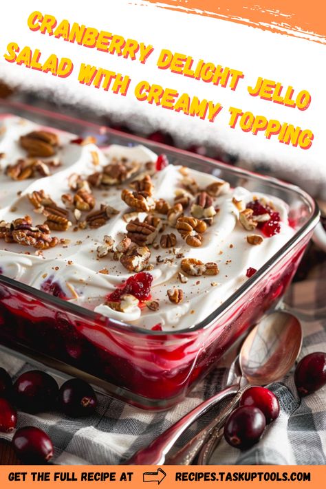 Discover the perfect balance of tart and sweet with our Cranberry Delight Jello Salad, an irresistible addition to your dining table. This classic dish features fresh cranberries suspended in flavorful gelatin, providing a refreshing burst of taste with every spoonful. Topped with a luxurious, creamy layer, this salad is a standout complement to holiday feasts or family gatherings. Elevate your menu with this crowd-pleasing favorite that boasts both vibrant colors and inviting flavors. Save this pin to ensure your guests are delighted Cranberry Grape Salad, Cranberry Salad Recipes With Jello Mandarin Oranges, Fresh Cranberry Jello Salad Thanksgiving, Jello Salad Recipes Easy, Holiday Jello Salad, Cranberry Recipes Salad, Cottage Cheese Jello Salad Recipes, Cranberry Gelatin Recipes, Junkyard Salad Recipe