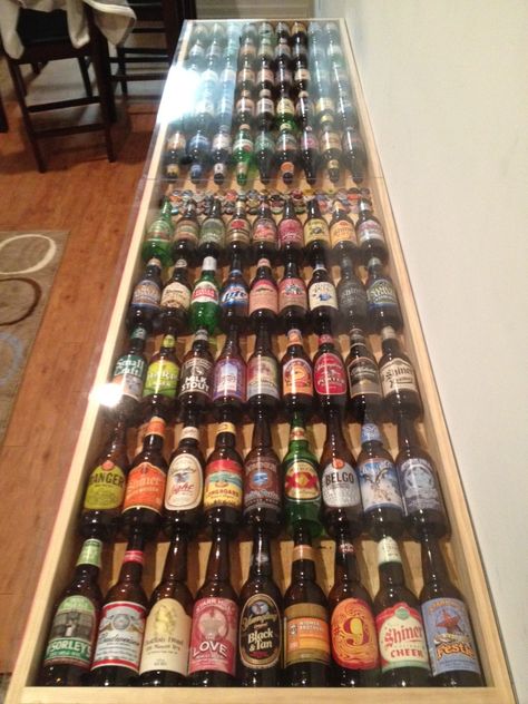 Not sure how much he's into beer pong. But it's pretty cool. Good luck to me (while making this) hiding this from the husband. Beer pong table made from 90 different beers! Rustic Mancave, Man Cave Basement, Beer Pong Tables, Woman Cave, Beer Bottles, Bar Room, Man Cave Bar, Basement Bar, Man Cave Garage