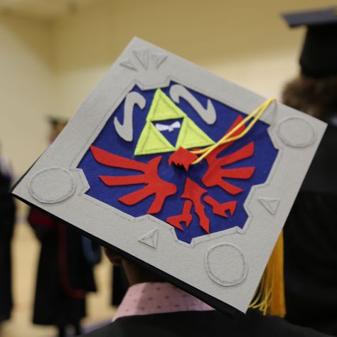 Check out this creative GSW grad cap! If you're decorating your cap for graduation, take a photo and tag us @gasouthwestern! #zelda #triforce Grad Cap Decorated, Graduation Cap Decoration Diy, Zelda Triforce, Grad Hat, Grad Cap Designs, Diy Graduation Cap, Geek Crafts, Graduation Cap Designs, Cap Decorations