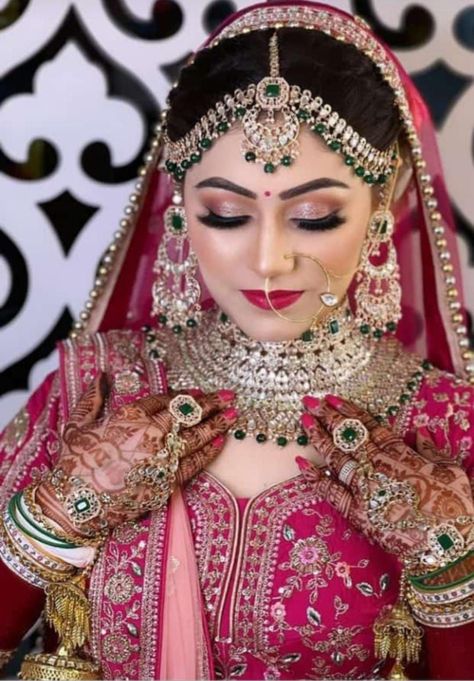 Your wedding is special to us, and we help you look your best. Make eyes roll on your wedding day with the magic of our experienced make-up artist. Call us at +918010667788 for bookings and enquiries. @marrigoldmarrigold #traditonalbride #brideinpink #bridallook #professionalmua #expertmua #nudemakeup #bridaljewellery #perfectbridallook #shaadidukaan Muslim Dulhan Pose, Muslim Bride Poses, Bridal Makeup Images Indian, New Dulhan Pose, Wedding Dulhan Pose, Bridal Makeup Pictures, Bridal Makeup Videos, शादी की तस्वीरें, Bridal Pose