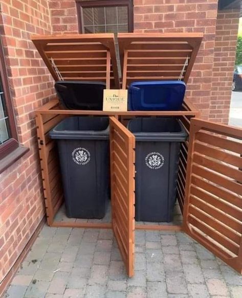 Wooden Bins Storage, Wooden Trash Bins Outdoor, Trash Bin Enclosure Outdoor, Wood Bins Storage, Front Of Garage Decor, Pallet Wheelie Bin Store, Wooden Garbage Bins Outdoor, Wood Garbage Bin Outdoor Storage, Garden Bin Storage Ideas