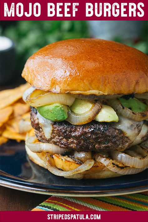 This gourmet burger recipe combines the bright, citrusy flavors of Cuban mojo sauce with a juicy all beef patty, grilled onions, and Manchego cheese. Topped with an easy to make Tequila Lime Aioli, these craft burgers are perfect for a festive summer cookout menu!  .. #stripedspatula #grilling #burger #hamburger #4thofjuly #picnic #beef #summerrecipes #recipeideas #recipe #recipeoftheday Mojo Beef, Cuban Mojo Sauce, Gourmet Burgers Recipes, Mojo Sauce, Cookout Menu, Cuban Mojo, Lime Aioli, Gourmet Burger, Manchego Cheese