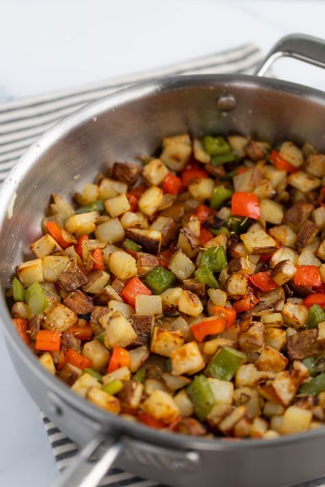 Learn how to make Skillet Potatoes that are crispy on the outside, fluffy on the inside with sweet peppers and onions for a delicious and healthy breakfast or side dish. Canned Peppers, Potatoes With Onions, Potato Skillet, Potato Latkes, Skillet Potatoes, Sweet Peppers, Pot Pies, Breakfast Potatoes, Sliced Potatoes