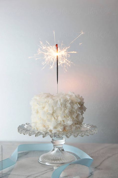 https://www.stocksy.com/2932497/white-chocolate-cake-with-sparkler-and-blue-ribbon White Bday Cake, White Birthday Cake Ideas, Cake With Sparklers, Red Velvet Cake Recipe Easy, Birthday Cake Sparklers, White Birthday Cake, Cake Sparklers, White Birthday Cakes, Vanilla Birthday Cake