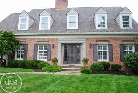 Sweet Chaos Home: The Painted House Reveal - door is SW Intellectual Gray and shutters are SW Urbane Bronze Front Door Makeover Ideas, Shutters Brick House, Door Makeover Ideas, Italianate Architecture, Exterior Door Trim, House Palette, Painted Bricks, Urbane Bronze, Brick Houses