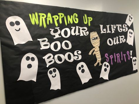 Halloween Decorations For Doctors Office, Nursing Halloween Decor, Halloween Nurse Bulletin Boards, Nurses Station Halloween Decor, School Nurse Halloween Door, Nurse Halloween Decorations, Medical Office Halloween Decorations, School Nurse Office Decorations Ideas, School Nurse Bulletin Board Elementary