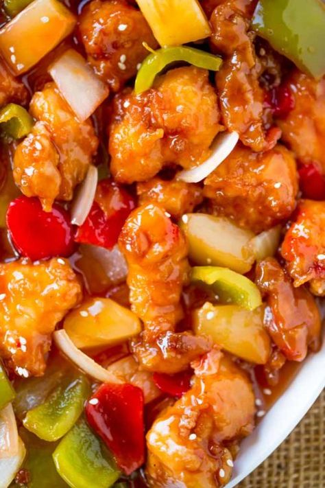 Sweet and Sour Chicken with crispy chicken, pineapple and bell peppers that tastes just like your favorite takeout place without the food coloring. Chinese Sweet And Sour Chicken, Sweet And Sour Chicken Recipe, Sour Chicken Recipe, Sweet And Sour Recipes, Chinese Chicken Recipes, Sweet And Sour Chicken, Sour Foods, Sweet Sour Chicken, Chinese Cooking Recipes