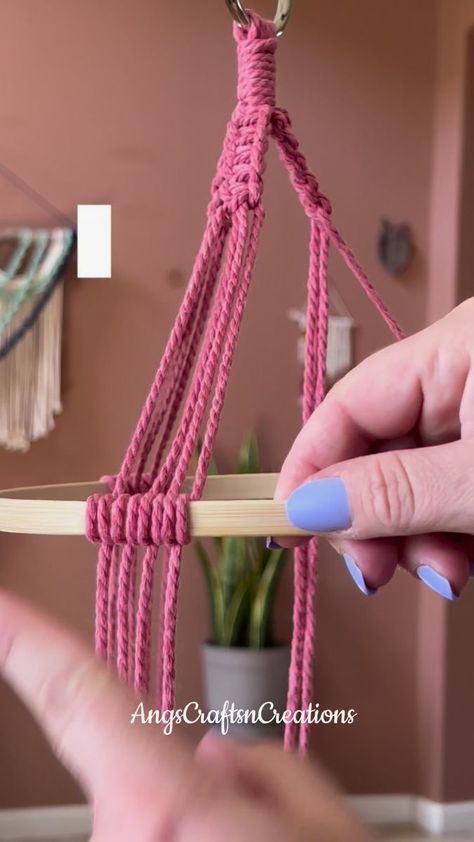 How to add a hoop to your macrame work. Think double half hitch but with the hoop as your filler cord. Head to my YouTube for macrame tutorials. #macrame #macrameartist #macrametutorial #macramecommunity #macramemakers #macramehowto #macrameknots #macramedecor #handmade #diymacrame #doublehalfhitch #angscraftsncreations | AngscraftsnCreations Macrame | Macrame Hoop, Half Hitch Knot, Macrame Tutorials, Macrame Planter, Hoop Projects, Macrame Hanger, Hanging Macrame, Macrame Decor, Macrame Knots