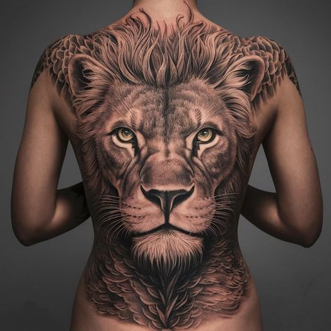 This full-back tattoo features a highly detailed lion's head, emphasizing the intricate line work and shading in the mane to create a realistic texture and Lion Back Tattoos Men, Back Tattoos Men, Lion Back Tattoo, Lion Tattoos, Full Back Tattoos, Back Tattoos For Guys, Yellow Boots, Line Work, Fish Swimming