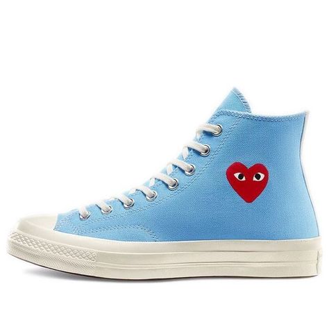 With a fresh take on a classic design, the Converse Comme des Garcons PLAY x Chuck 70 High Bright Blue is a must-have sneaker for any fashion-savvy individual. The signature heart logo from Japanese fashion label Comme des Garçons is prominently featured in High Risk Red, adding a pop of color to the otherwise understated sneaker. Additionally, the shoe features shiny chrome eyelets, a white textile heel strip, and winged stitch detailing on the tongue for added visual interest. Resting on an elevated rubber midsole, this high-top sneaker is perfect for making a statement without sacrificing comfort. Commes Des Garcons Converse, Converse X Comme Des Garcons, Converse Comme Des Garcons, Garcons Converse, White Textile, Comme Des Garcons Play, Heart Logo, Chuck 70, Blue Canvas