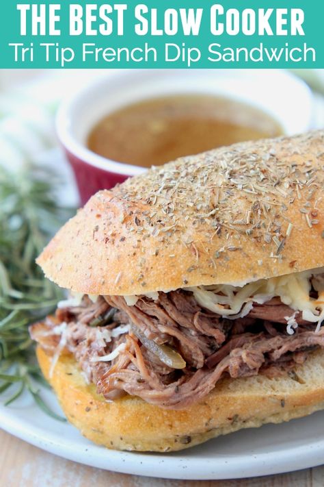 Rosemary Garlic Tri Tip is slow cooked in a crock pot. It's then shredded and served on Rosemary Focaccia Bread with au jus to create this scrumptious French Dip sandwich recipe! It only takes about 20 minutes of hands-on time to prepare this easy tri tip recipe. The crock pot will do the rest of the work for you! Tri Tip Recipes Crockpot, Slow Cooker Tri Tip, Tritip Recipes, Tri Tip Steak Recipes, French Dip Sandwich Recipe, Rosemary Focaccia Bread, French Dip Recipes, French Dip Crock Pot, Rosemary Focaccia