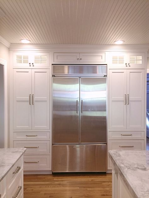 Kitchen Pantry Fridge Wall, Refrigerator Pantry Surround, White Custom Kitchen Cabinets, Fridge Wall With Pantry, Built In Refrigerator Wall With Cabinets, Kitchen Fridge With Cabinets, Kitchen Fridge Wall Ideas, Refrigerator Inset In Wall, Pantry Wall Cabinets With Fridge