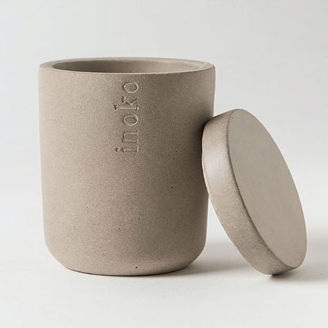 The Inoko large concrete candle vessel is both urban and edgy with its minimalist style. This candle jar is a neutral classic that will suit a wide range of interior styles from Scandinavian, Industrial, Contemporary, or Modern. Designed to hold a large Inoko candle fragrance refill (sold separately). Choose your favourite fragrance in the large refill size to complete your Inoko candle jar. Available in 14 popular fragrances – simply replace the refill when it runs out, or keep a few different Concrete Candle Vessels, Marble Jar, Contemporary Candles, Candle Vessel, Industrial Contemporary, Candle Fragrance, Concrete Candle, Concrete Pots, Candle Branding