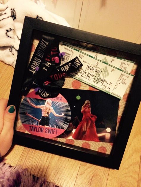 I made this shadow box from when i went to the red tour. I bought shawdow boxes then coverd the back thing if came with with fun paper then tacked on my tickets lanyard and a pic i took Concert Keepsake Ideas, Concert Memory Frame, Taylor Swift Shadow Box Ideas, Concert Memorabilia Display, Shadow Box Concert, Concert Shadow Box Ideas, Concert Ticket Display, Taylor Swift Reputation Tour, Taylor Swift Guitar