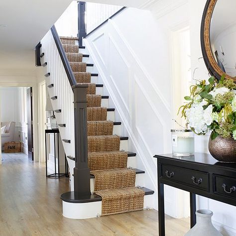 Cream And Black Stairs, Black And Neutral Staircase, White Hall Black Banister, Small Staircase Ideas Decor, Lydia Millen Home, Black Staircase Cream Carpet, Black Bannister Grey Carpet, Lydia Elise Millen House, Narrow Staircase Ideas