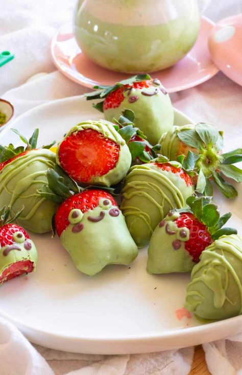 These white chocolate matcha covered strawberries are super easy to make and very yummy. Make them elegant with a drizzle OR have fun and turn them into a frog shaped dessert. White chocolate matcha strawberries are the perfect Valentine's Day treat or a fun snack to make year round. If you've been looking for unique chocolate covered strawberries, this recipe is perfect! White Chocolate Matcha, Frog Food, Matcha Baking, Strawberry Bites, White Chocolate Covered Strawberries, Snack To Make, Matcha White Chocolate, White Chocolate Covered, Fairy Food