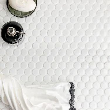 Paradise 2.0 Collection | TileBar.com Penny Tile Floors, Cleaning Ceramic Tiles, Cleaning Tile Floors, Backsplash Wall, Penny Round Tiles, White Marble Tiles, Penny Tile, Polish Ceramics, Round Tiles