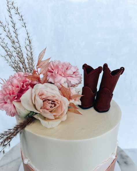 These boots were made for walkin’ 👢 • • • #cowgirlcake #cowgirlcaketopper #floralcake #countrycake #cowboycake #horsecake #kidscake #birthdaygirl #birthdaycakeideas #cutecake #moderncake #driedfloralcake #cakedesigninspo #modernkidscakes #prettycake #519cakes #519bakery #cakeshop #customcakeshop Western Cakes Birthday For Women, Western Cakes Birthday, Cowgirl Cakes Birthday, 17th Birthday Cake Ideas, Western Baby Shower Cake, 17th Birthday Cake, Western Cake, Cowgirl Cakes, Cowboy Cakes