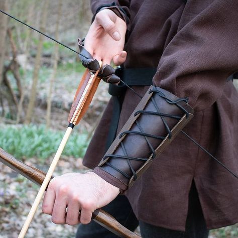 Folk Of The Wood on Instagram: “Our 10-30% off sale remains live through Monday! We have a huge selection, make your gifts unique, personal and memorable this year! Just…” Archery Arm Guard, Archery Gloves, Medieval Garb, Leather Bracers, Bow String, Leather Lacing, Traditional Archery, Arm Guard, Medieval Style