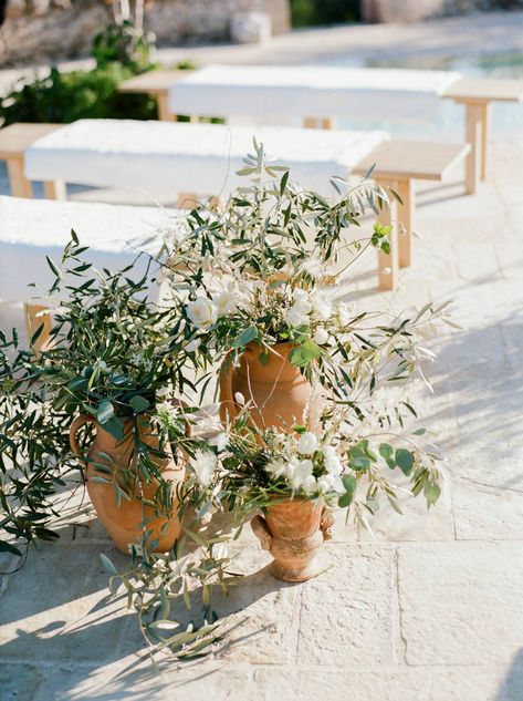 Potted Plants Down Wedding Aisle, Flowers In Terracotta Pots Wedding, Olive Wedding Arch, Spanish Floral Arrangements, Puglia Wedding Flowers, Terracota And Greenery Wedding, Rustic Mediterranean Wedding, Simple Tuscan Wedding, Mediterranean Flowers Arrangements