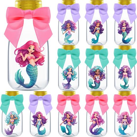 PRICES MAY VARY. INCLUDES: 12 Plastic Bottles, Gold Caps, Ribbons, Mermaid, Stickers, and Thank You Stickers. Each bottle measures 4.00 x 1.80 inches and holds 4 ounces, perfect for creating under the sea party decorations UNIQUE JARS - Each package comes with 12 unique mermaid stickers to add a personalized touch to each bottle. Send everyone home feeling appreciative of the extra creativity in your thoughtful keepsakes EASY TO SETUP - These jars are quick to setup in seconds. Just add treats, Oneder The Sea 1st Birthday Centerpiece, Mermaid Centerpiece Ideas, Under The Sea Centerpieces, Little Mermaid Centerpieces, 1st Birthday Centerpieces, Mermaid Table, Unique Jars, Mermaid Party Favors, Mermaid Sticker