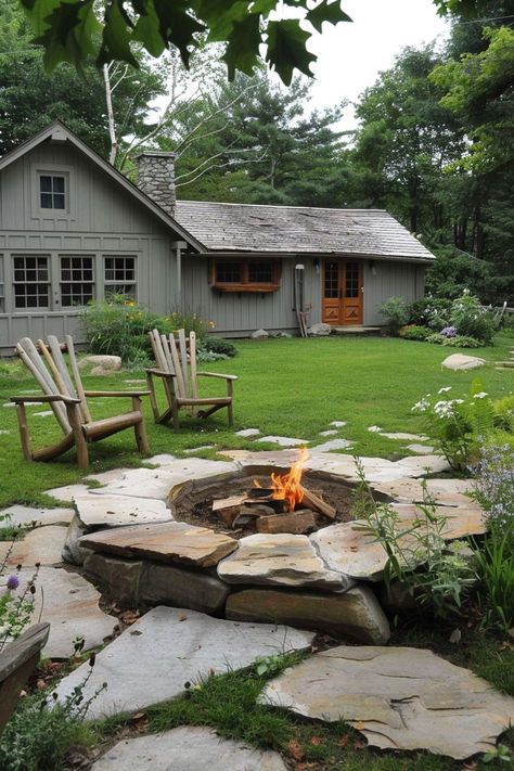 Ignite your backyard's potential with affordable DIY fire pit ideas. Design a welcoming lounge area where friends and family can gather under the stars. Our budget-friendly landscaping designs transform any outdoor space into a cozy retreat. Lake Fire Pit Ideas, Fire Pit Layout Ideas, Diy Backyard Lounge Area, Landscape Fire Pit Ideas, Fire Pit Cottage, Diy Outdoor Area Ideas, Fire Pit Area Ideas Backyard On A Budget, Adirondack Fire Pit, Gas Outdoor Firepits