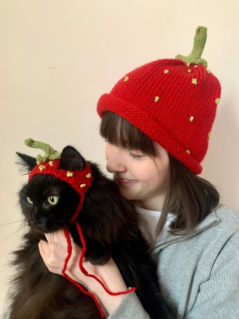 🍓Now with option of traditional beanie or bucket hat for the human version! 🍓 A funky pair of hand knitted strawberry hats, one each for your four legged friend and their owner, perfect for the most dedicated crazy cat person in your life! One size fits most, with nice stretchy ear holes on the cat hat to tame the fluffiest of beasts!  Get it on and grab your phone quickly to capture that purrfect picture! Dusty the 5 year old rescue cat has kindly modelled here (for a modest fee) the red hat Crochet Hat For Cat, Knitted Strawberry, Cat Hat Pattern, Strawberry Hat, Cat Hats, Strawberry Cat, You Are My Moon, Matching Hats, Cat Beanie