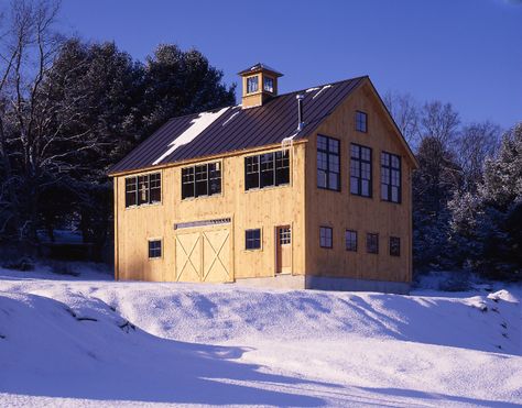 The Hartford Carriage House is designed to look like a classic New England barn. The 26-ft x 38-ft frame creates ample space to store two or three vehicles. The second level has a full 8-ft kneewall for ample headroom, and comfortably fits 2 full bedrooms and a loft.  Renderings provide a view of a future addition. Small Barn Home, Small Barn House, Yankee Barn Homes, Post And Beam Home, Carriage House Plans, Barndominium Floor Plans, Barn Homes, Post And Beam, Pole Barn Homes