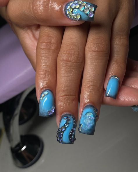 cutest octopus x jellyfish freestyle for my sister 🪼🫧 @unicorn_kenny giving cunty octopus 🐙 —— Want to book the look? Service - Short polygel extensions Add ons - Nail art, charms Don’t forget to send in those client cams to be posted 📸 🤳🏼 @polished.by.lynn —— #polygelnails #polygel #makartt #makarttpolygel #polygelnailtech #nailartist #beginnernailtech #nailtech #brooklynnailtech #queensnailtech #nycnailtech #cypresshillsnailtech #brooklyn #nyc #queens #cypresshills #auranails #nailcharm... Kraken Nails, Octopus Nails, Nyc Queens, Nail Art Charms, Cute Octopus, Polygel Nails, Nail Charms, Add Ons, Kraken