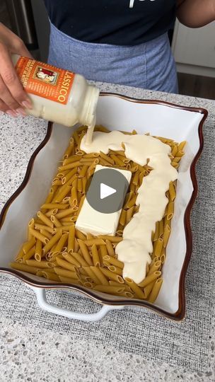 28M views · 129K reactions | Italian Chicken Alfredo | I learned this pasta recipe in Italy 😍 | By The Pun Guys | Let's start with some cream cheese. And now all around that cheese we're going to add a full box of penne pasta. Now on top of that pasta we're going to need two jars of Alfredo sauce. We're also going to need some freshly grated mozzarella cheese. I'm just going to place that right on top of that lovely Alfredo sauce. Now it's time to season everything starting with some salt. We're also going to need some black pepper, some garlic powder. We're also going to need some dried basil and last but not least we're just going to need some dried oregano. We're also going to need a few tablespoons of minced garlic. Now we're going to need some liquid to help cook that pasta. And I'm Italian Chicken Alfredo Recipe, Raos Alfredo Recipes, Pun Guys Recipes, The Pun Guys Recipes, Chicken Alfredo Using Ragu Sauce, Quick Easy Pasta Recipes, Italian Chicken Pasta In Creamy White, Cheese Chicken Alfredo Pasta Bake, Italian Chicken Pasta In Creamy White Wine Parmesan Cheese Sauce