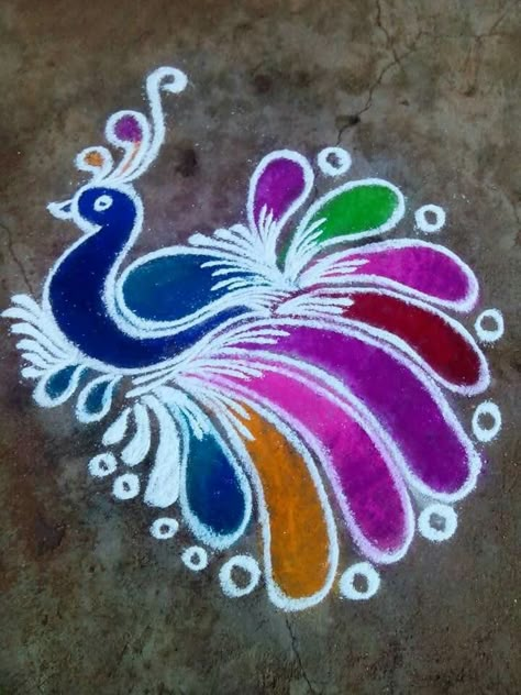 Another beautiful peacock rangoli! Rangoli Peacock, Peacock Rangoli Designs, Indian Rangoli Designs, Peacock Rangoli, Easy Rangoli Designs Diwali, Rangoli Designs Latest, Sidewalk Chalk Art, Rangoli Patterns, Rangoli Ideas