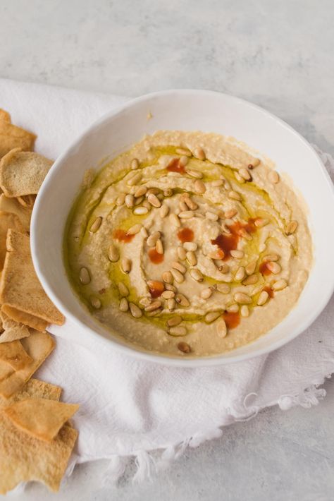 This Copycat Sabra Hummus Recipe is the perfect homemade snack to serve at your next party or potluck. It's super easy to make, and it tastes just like Sabra's classic hummus! Sabra Hummus Recipe, Easy Pies, Sabra Hummus, Classic Hummus, Homemade Bar, Slow Cooker Times, Copy Cats, Healthy Afternoon Snacks, Bar Food