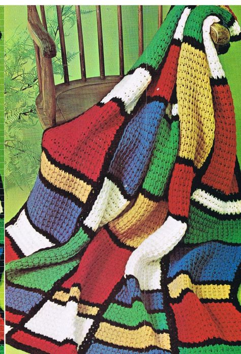 "Make this amazing Mondrian inspired afghan in vibrant colours, using a thick hook and Tunisian crochet technique. Even if you haven't tried Tunisian crochet before - it's in fact the original 'afghan stitch' - instructions with illustrations are given to help you. The blanket is made in five strips, then joined together and edged in black. Yarn is used double with a thick hook so will work up quickly.  For the afghan in Pic 1 measuring approx 54\" x 62\" you will need- worsted weight yarn in th Quick Crochet Afghan, Stained Glass Afghan, Motivi Afgani, Motifs Afghans, Crochet Throws, Afghan Stitch, Fast Crochet, Tunisian Crochet Pattern, Crochet Blanket Pattern Easy