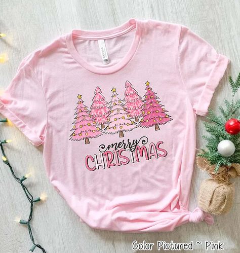 Pink Merry Christmas Tree Shirt, Merry & Bright Christmas Shirt, Holiday Tee, Womens Holiday Shirt, Christmas Gift, Christmas Party Shirt #ChristmasGift #ChristmasHoodie #ChristmasMatching #ChristmasPajamas #ChristmasShirt #ChristmasSweater #ChristmasSweatshirt #ChristmasTreeShirt #FamilyChristmasTee #FamilyMatching #FunnyChristmasTee #HolidaySweatshirt #HolidayTee #MatchingChristmas #MerryAndBright #MerryChristmasTee #PersonalizedGifts #SantaShirt #WomensChristmas #MonogramChristmasShirt Htv Shirt Ideas, Pink Merry Christmas, Merry Christmas Family, Merry Bright Christmas, Merry Christmas Tree, Christmas Party Shirts, Womens Christmas Shirts, Womens Christmas, Comfort Colors Sweatshirt