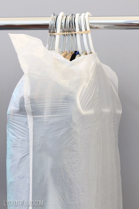 Cover clothes with a trash bag for easier moving - these moving hacks are so good! Wish I had them for my last move! ad Packing Hangers, Trash Clothing, Pods Moving, Moving Clothes, Moving House Tips, Moving Hacks, Moving Hacks Packing, Organizing For A Move, Packing Wardrobe