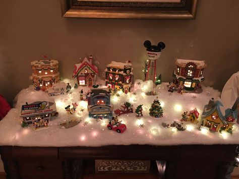 Disney Christmas Village Disney Christmas Village Display, Christmas Village Mantle, Disney Christmas Village, Mantle Decorations, Christmas Village Collections, Christmas Mantle Decor, Christmas Village Display, Village Display, Christmas Town