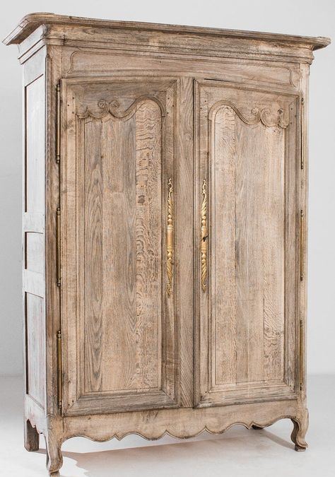 The Estelle French Oak Armoire - Circa 1800 redefines beauty with its historical charm and graceful presence. Precise hand-carved curvature details surround the oversized doors which reveal 3 fixed storage shelves. A bleached oak finish is neutral and easy to incorporate. #french, #antique, #armoire French Antique Furniture, French Country Armoire, Louis Xvi Furniture, Elegant Outdoor Furniture, Mirrored Armoire, Cottage French, French Armoire, Antique Armoire, Farm Living