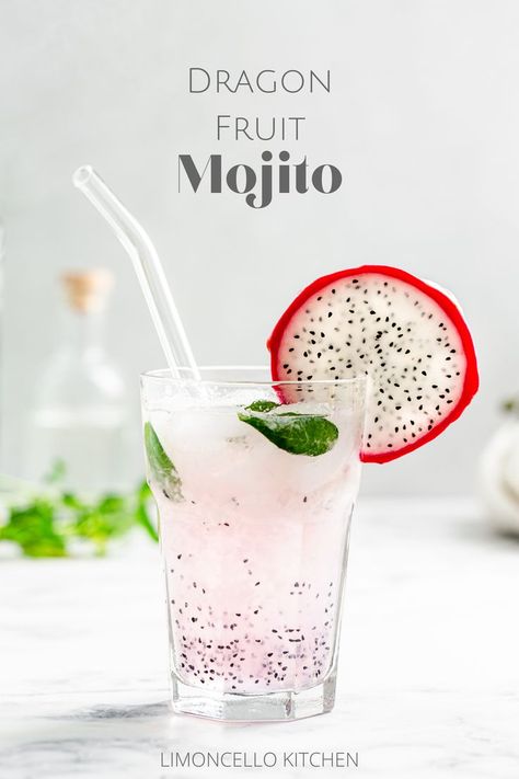 Pink cocktail with black dragon fruit seeds and mint leaves and a slice of dragon fruit as a garnish. Cocktail With Mint, Refreshing Rum Cocktails, Fruit Mojito, Dragon Fruit Juice, Summer Get Together, Mojito Drink, Mint Cocktails, Iced Drinks Recipes, Summer Drink Recipes