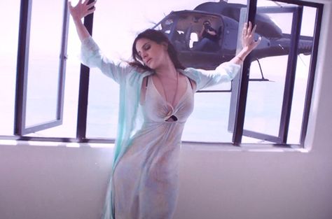 BILLBOARD: Lana Del Rey Guns Down Paparazzi in 'High By the Beach' Video Lana Del Rey High, Terrence Loves You, Lana Del Rey Music, Lana Del Rey Honeymoon, High By The Beach, 2015 Music, American Werewolf In London, Beach Video, Elizabeth Grant