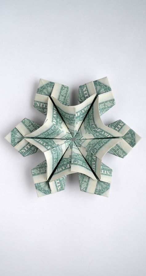 The money snowflake is an excellent decoration for Christmas! We need 6 dollar bills, a double-sided tape. The idea and design by Anastasia Prokuda. I wish you a pleasant viewing! Subscribe to my channel! Folding Money For Christmas, Money Snowflake, How To Fold Money For Gifts, Money Decorations, Paper Flower Crafts For Kids, Dollar Folding, Snowflake Origami, Flower Making Paper, Money Origami Tutorial