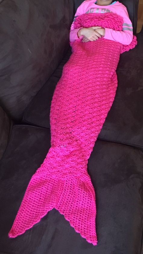 this free crochet pattern for a mermaid tail blanket is super easy to follow with pictures and video tutorial help options to see how some of the stitches are done Crochet Mermaid Blanket Pattern Free, Mermaid Tail Crochet Pattern, Crochet Mermaid Tail Pattern Free, Free Mermaid Tails, Mermaid Tail Blanket Pattern, Crocheted Mermaid, Crochet Mermaid Blanket, Mermaid Tail Blanket Crochet, Mermaid Tail Pattern