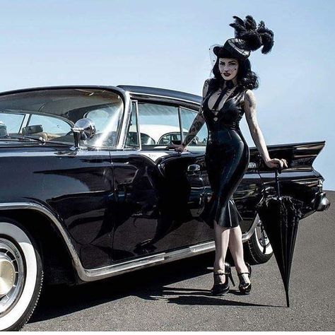 Image may contain: 1 person Girl Car Accessories, Gothabilly Fashion, Goth Car, Psychobilly Fashion, Goth Pinup, Girl Car, Goth Subculture, Goth Glam, Gothic Glam