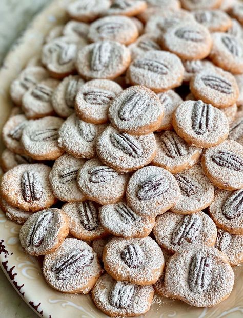 You'll love this Cheese Wafers recipe made with sharp cheddar cheese and a hint of cayenne pepper! These bite-size cheesy wafers are topped with toasted pecans and dusted with powdered sugar for the perfect appetizer at holiday gatherings. Cheese Wafers With Pecans, Cheese Wafers Recipe, Wafers Recipe, Cheese Wafers, Cheese Biscuits, Sharp Cheddar, Sharp Cheddar Cheese, Toasted Pecans, Cayenne Pepper