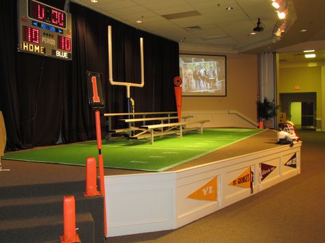 YL Banquet "Friday Night Lights" stage, football, goalposts, pennants Football Stage Design, Friday Night Lights Movie, Friday Night Lights Quotes, Sports Vbs, Homecoming Floats, Football Banquet, Stage Designs, Light Blue Sweatshirt, Vbs 2023