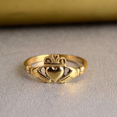 Gold Claddagh Ring, Tiny Celtic Irish Ring, Personalized Ring, Promise Ring, Birthday Gifts, Gift for Her, Claddagh Ring ♥DETAILS♥ *Materials: Brass *Size: All sizes are available. ❥ Add this beautiful one little thing of galactic shine to make you feel unique and to transform your lives. Perfect for any kind of outfit and every occasion. ❥ Customers satisfaction is our biggest priority, please contact us with any questions/queries for future or existing orders, and we will do our best to make s Claghda Ring, Claddagh Ring Aesthetic, Irish Heart Ring, Irish Ring, Claddagh Ring Wedding, Gold Claddagh Ring, Irish Ring Claddagh, Irish Rings, Friendship Ring