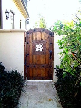 Spanish Style Gate Design Ideas, Pictures, Remodel, and Decor Mediterranean Exterior Design, Wooden Garden Gate, Backyard Gates, Mediterranean Exterior, Spanish Decor, Side Gates, Wood Gate, Spanish Style Home, Spanish Style Homes