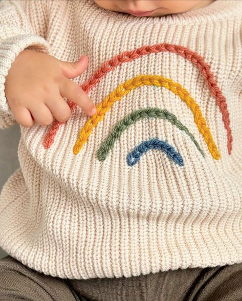 Enhance your little one’s winter wardrobe with our adorable hand-embroidered rainbow sweater!🌟 With sizes available from 0-3 months to 2 years, our keepsake sweaters are not only cosy and comfortable but also personalised with a hand-embroidered design, making them the ultimate statement piece for any occasion, capturing the essence of your little one’s personality. We can’t wait to help you celebrate every precious moment in style. Because when it comes to your baby, only the best will do... Hand Embroidered Baby Clothes, Embroidered Baby Clothes, Embroidered Rainbow, Baby Keepsakes, Rainbow Sweater, Baby Embroidery, Embroidered Sweater, Baby Cardigan, Baby Sweaters