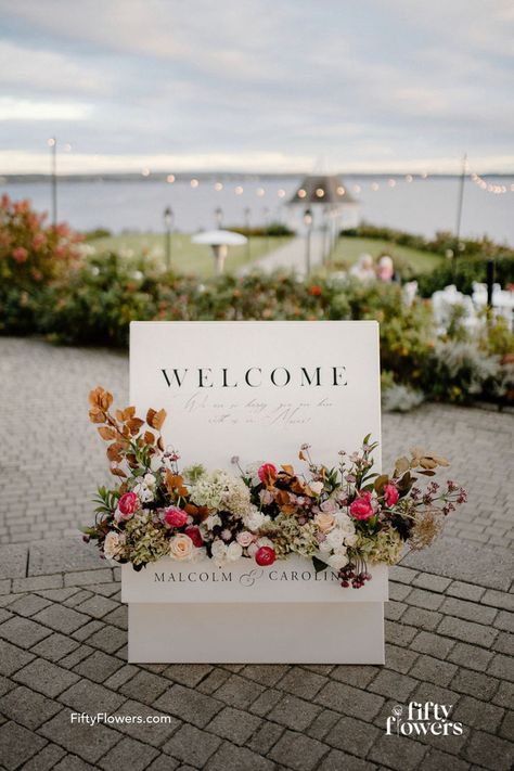 An image of a welcome wedding flower box featuring a variety of white and pink flowers and greenery. Wedding Entry Signs, Flower Box Sign, Flower Box Welcome Sign, Welcome Flowers, Flower Sign, Welcome Sign Wedding, Entry Signs, Floral Trends, Wedding Expo