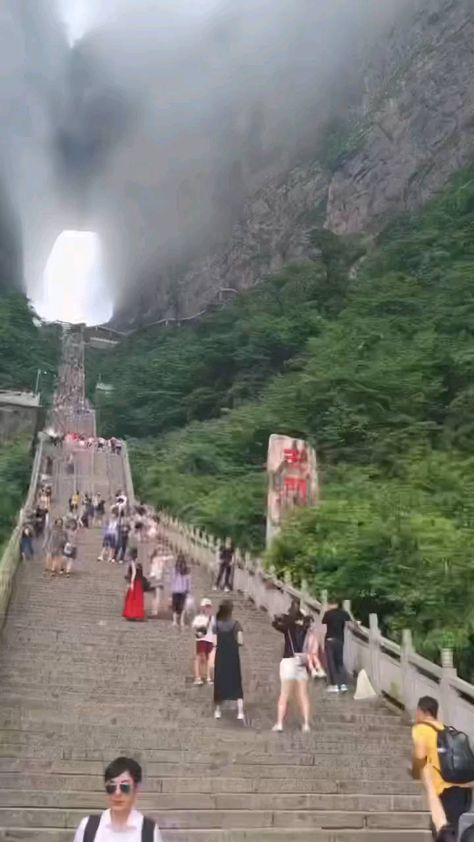 awesome.earthpics on Instagram: The Gate to Heaven!🌟 Who’d you love to visit this place with?☘️ 📌 Tianmen Mountain National Forest Park, located 8km away from Zhangjiajie… Zhangjiajie China, Tianmen Mountain, Zhangjiajie, Mysterious Places, Forest Park, American Cities, Day And Time, To Heaven, National Forest